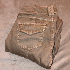 Tan White House Black Market cargo jeans.